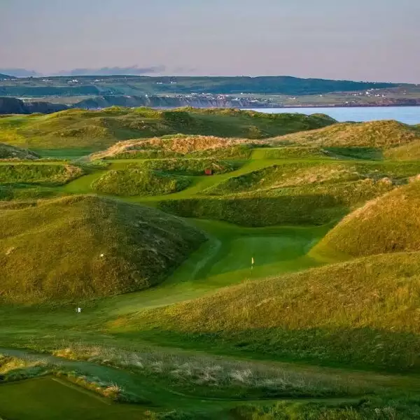 Play a round at Doonbeg Golf Club overlooking the Atlantic.